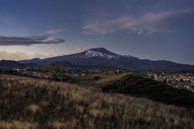 Scenic view of snowcapped mountains against sky