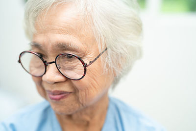 Close-up of young man wearing eyeglasses