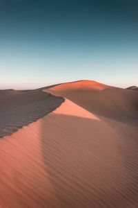 Scenic view of desert against clear sky