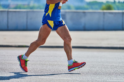 Low section of man running