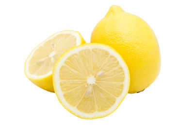 Close-up of lemon against white background