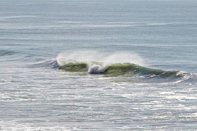 Sea waves splashing on shore