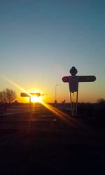 Street light against sky during sunset