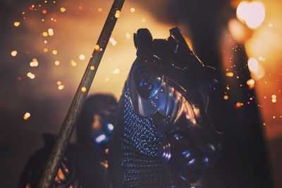 Illuminated statue at night