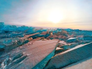 Aerial view of landscape against sky during sunset