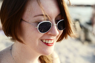 Close-up of young woman looking away