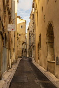 Street amidst buildings. montpellier, france
