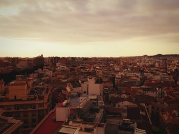 High angle view of townscape against sky at sunset