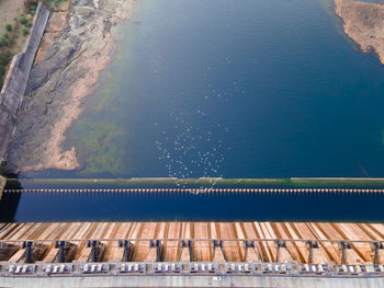High angle view of dam by sea