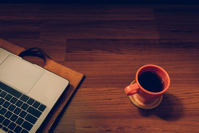 High angle view of coffee cup on table