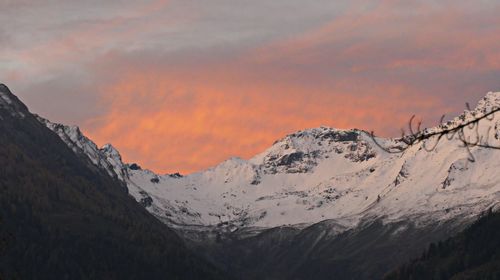 Scenic view of mountains against sky during sunset