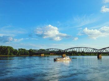 Bridge over river against sky