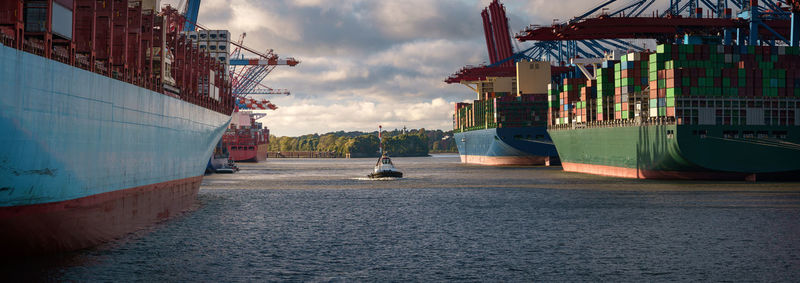 View of commercial dock against sky