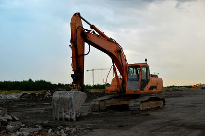 Construction site on field against sky