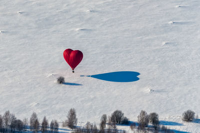 Low angle view of hot air balloons against sky