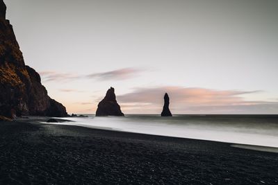 Scenic view of sea at sunset