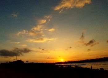 Scenic view of dramatic sky during sunset