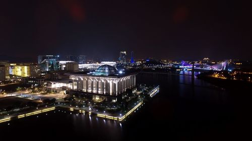 Illuminated cityscape at night