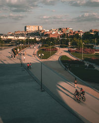 High angle view of people on road in park against sky