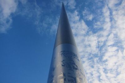 Low angle view of building against blue sky