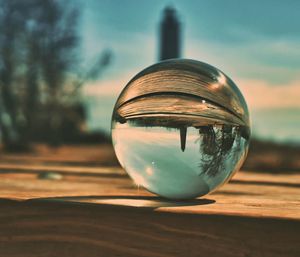 Close-up of crystal ball on table