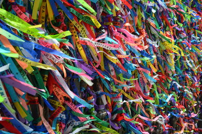 Full frame shot of multi colored flags hanging