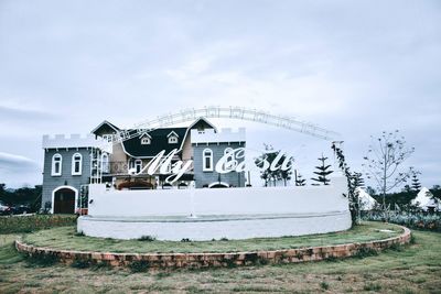 Built structure on beach against sky