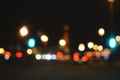 Defocused image of illuminated lights at night