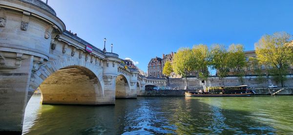 Bridge over river against clear sky