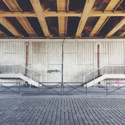 Metal bridge over railroad tracks