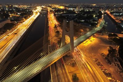 High angle view of light trails on road at night