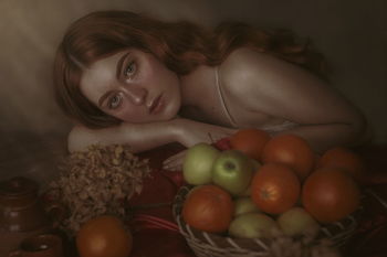 Portrait of young woman with long hair by fruits