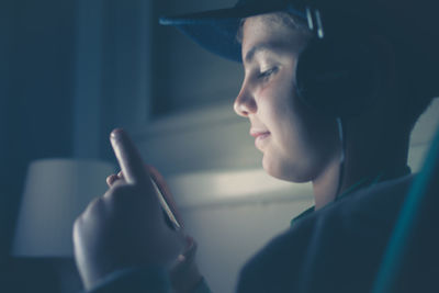 Close-up of man using mobile phone