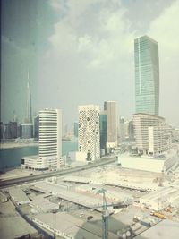 Modern cityscape against sky