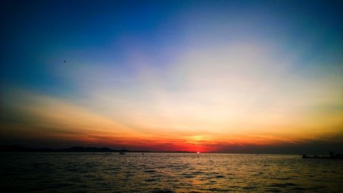 Scenic view of sea at sunset