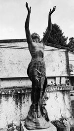 Low angle view of statue against sky