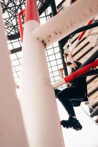 Low section of woman sitting on floor