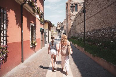 People walking on road in city