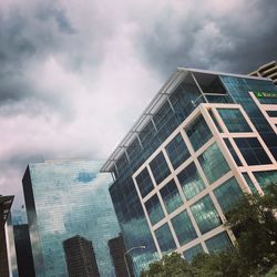 Low angle view of modern buildings against sky