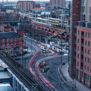 High angle view of light trails on road in city