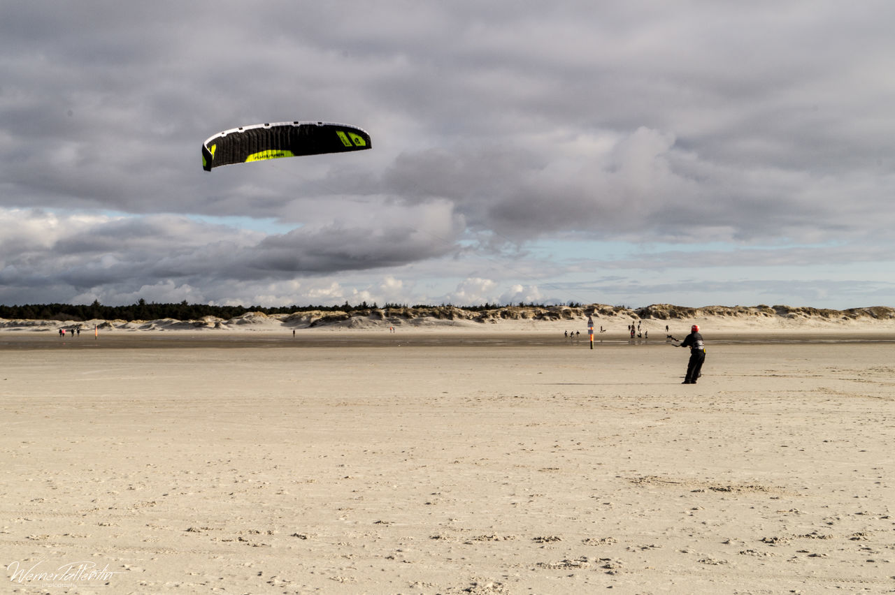 TOURISTS ON BEACH