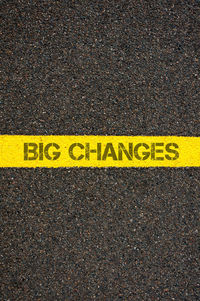 High angle view of yellow text on road