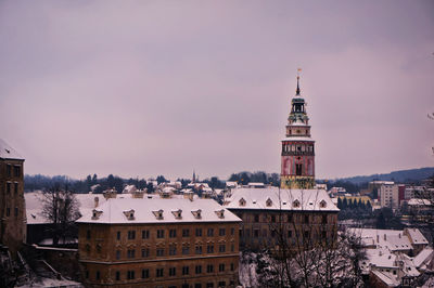 View of tower in city during winter