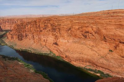 High angle landscape of the colorado river in a deep orange canyon