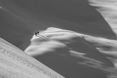 High angle view of people skiing on land