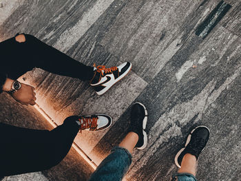 Low section of people standing on street