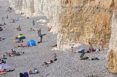 High angle view of people enjoying at beach