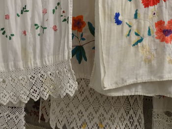 Close-up of white curtain hanging at home