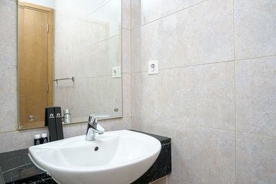 Close-up of sink in bathroom