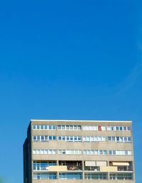 Modern building against blue sky